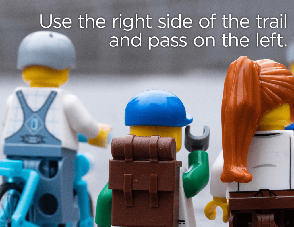Lego figures with text reading: "Use the right side of the trail and pass on the left."