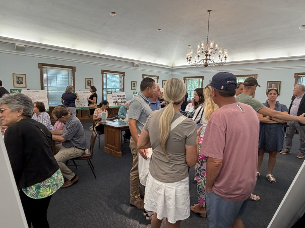 Community members talking at the Brentwood to Tilles Park June open house